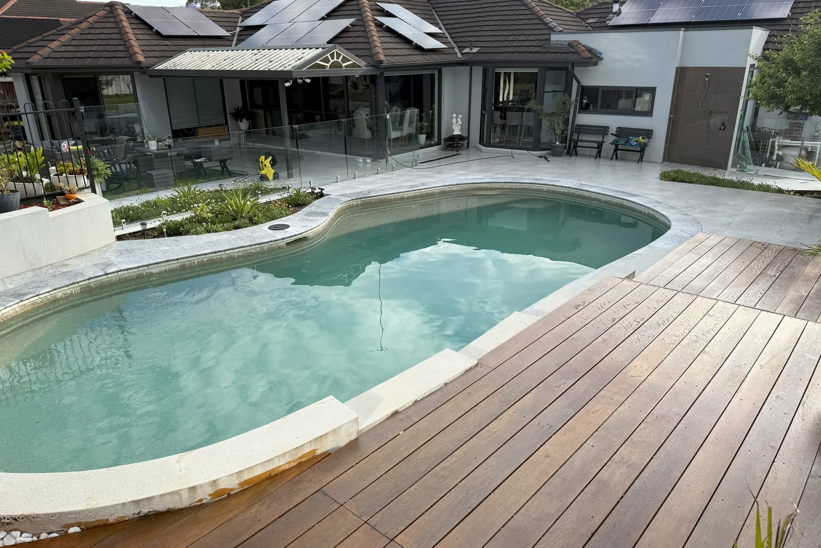 After: Pool deck & yard — Whole-home renovation